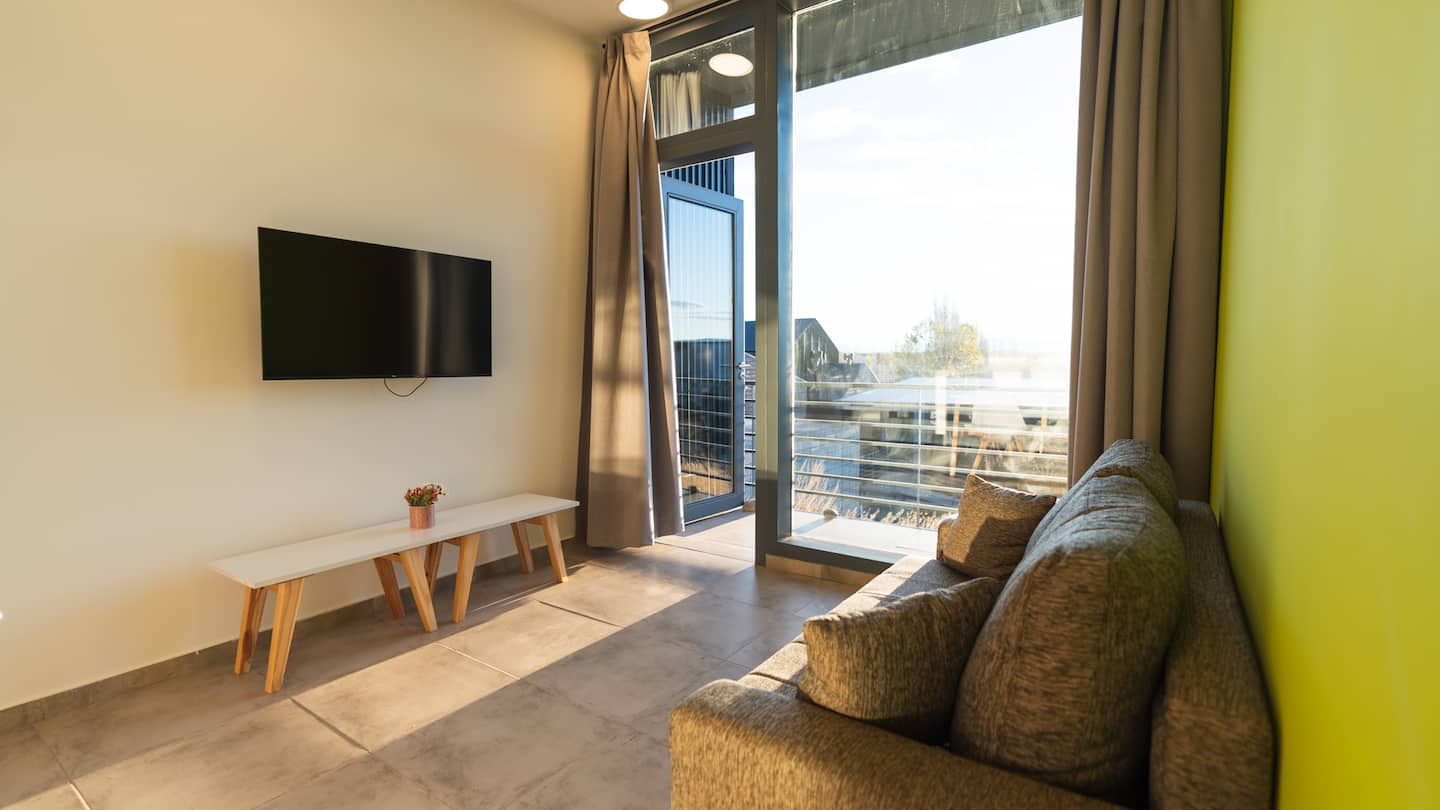 Moderno departamento con una vista única – Living